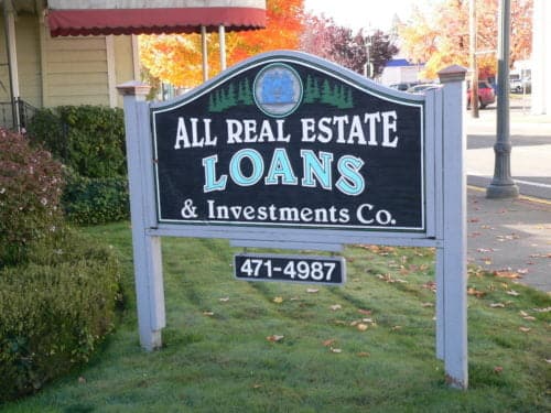 Image of the All Real Estate Loans company sign